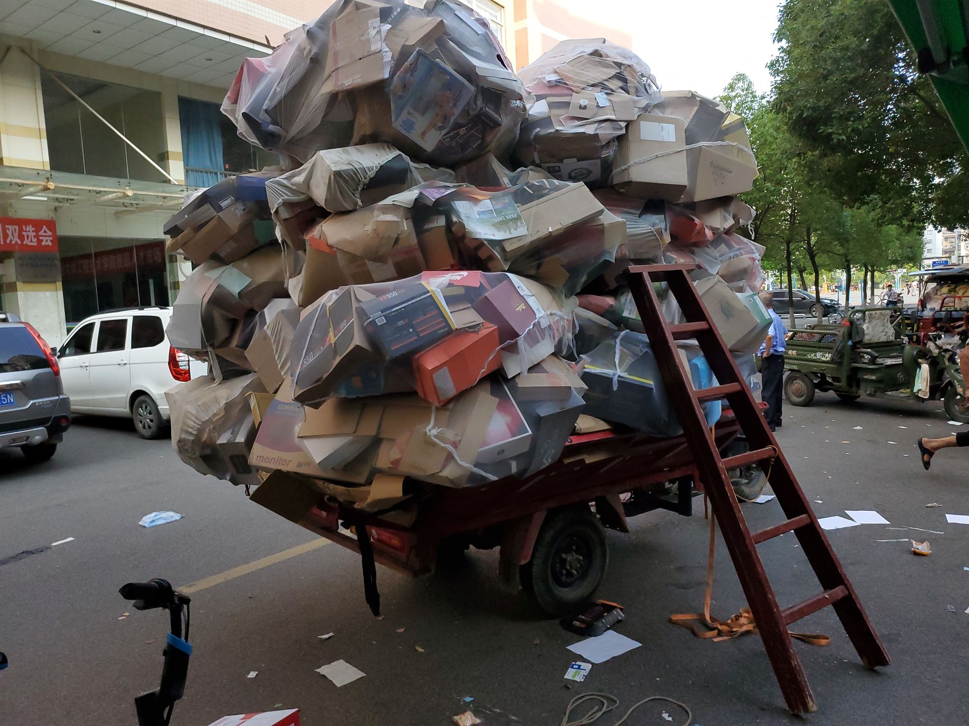 big stack of garbage on cart